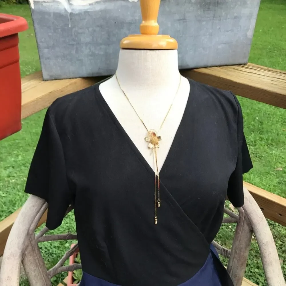 Vintage gold tone flower slide lariat necklace - mesh gold tone rose slide